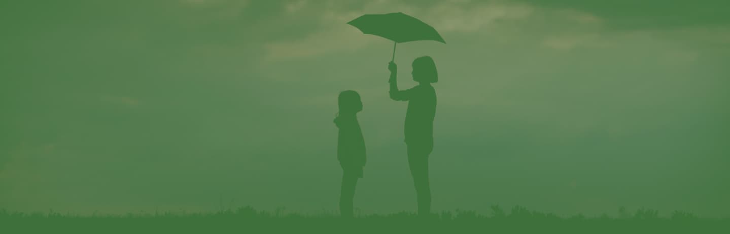 People standing under an umbrella